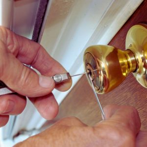 Picking a door lock with lockpicks