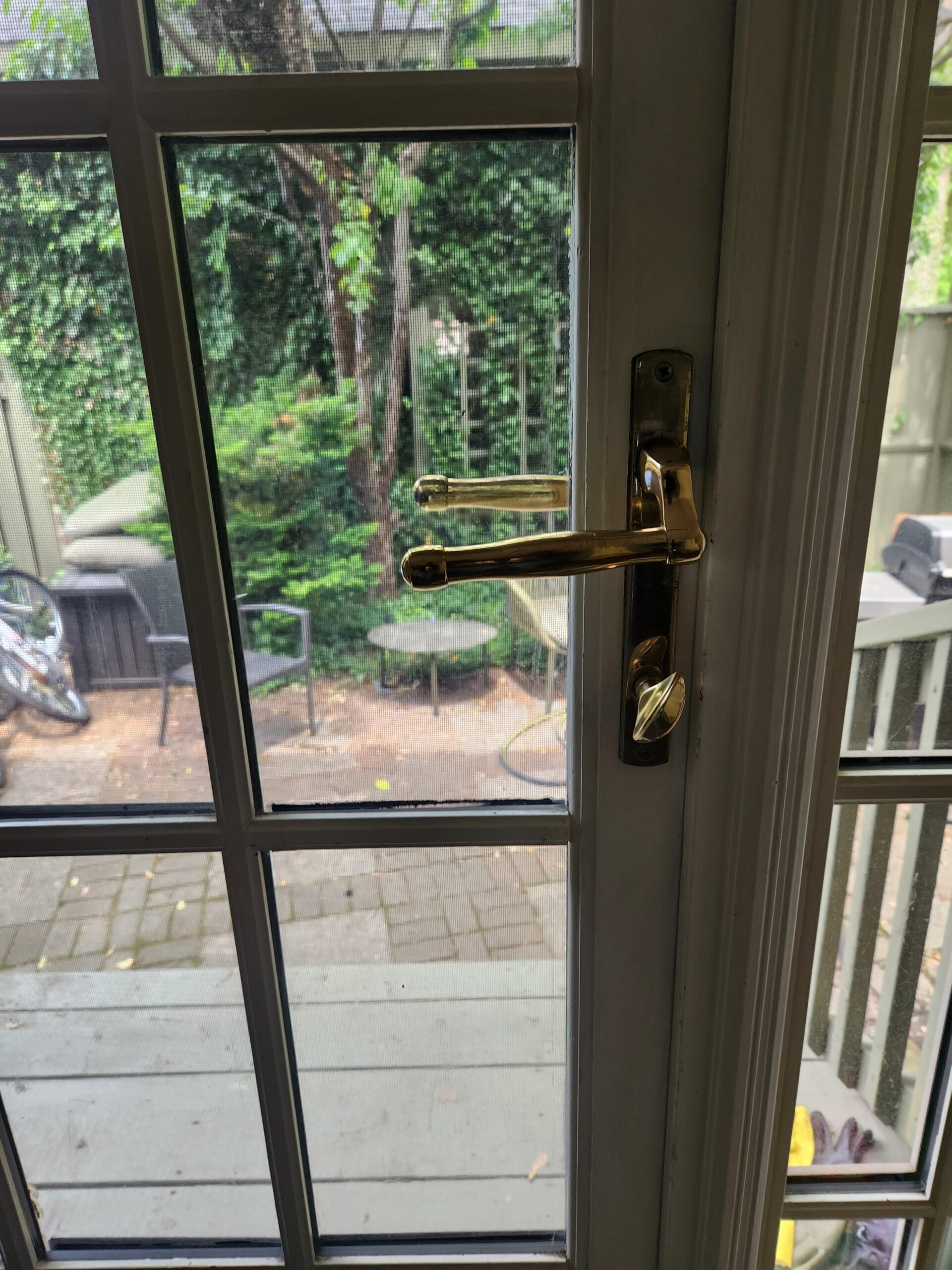 Glazed residential entrance with brass handle hardware