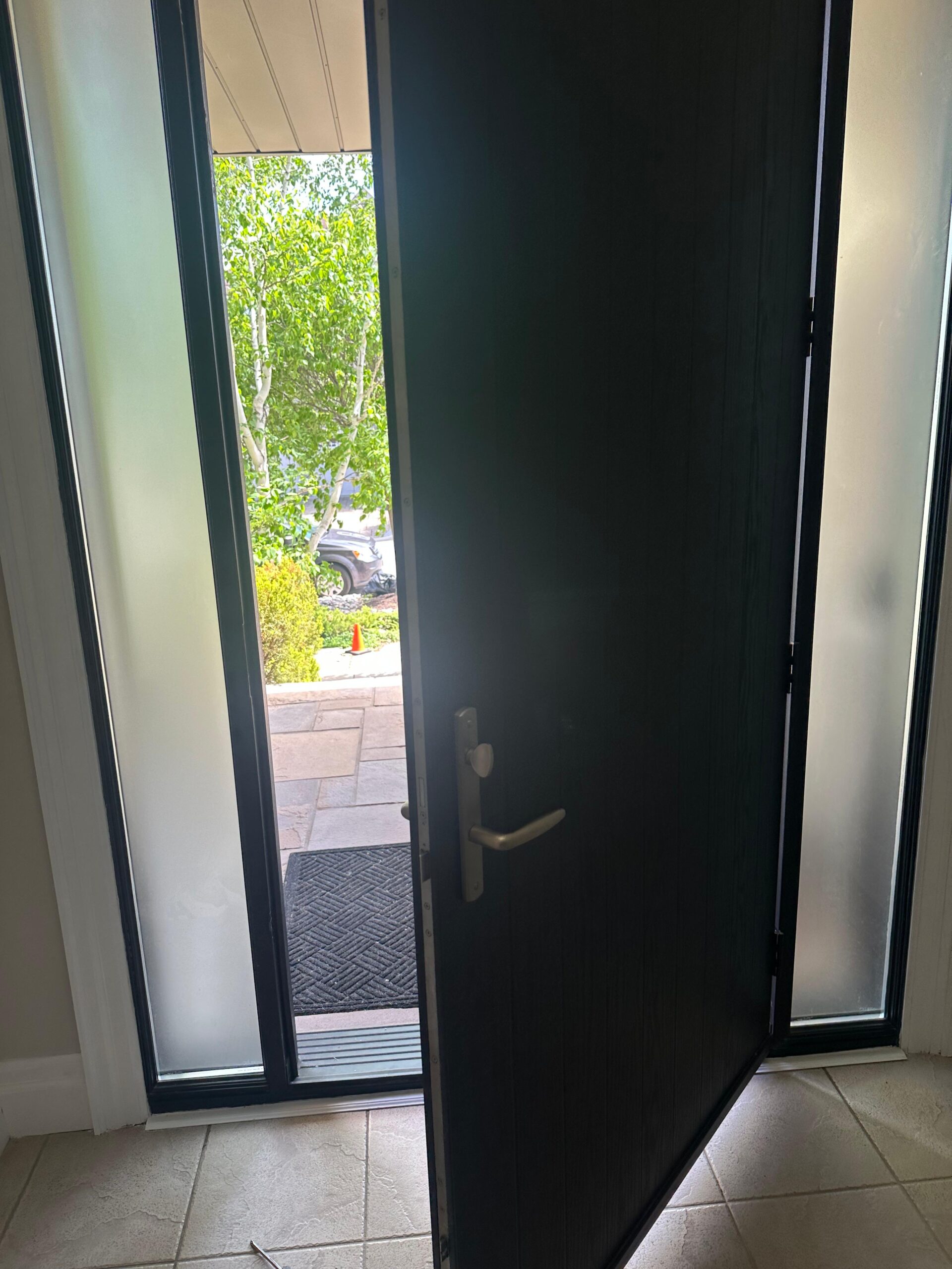 Entrance door frame strike reinforcement