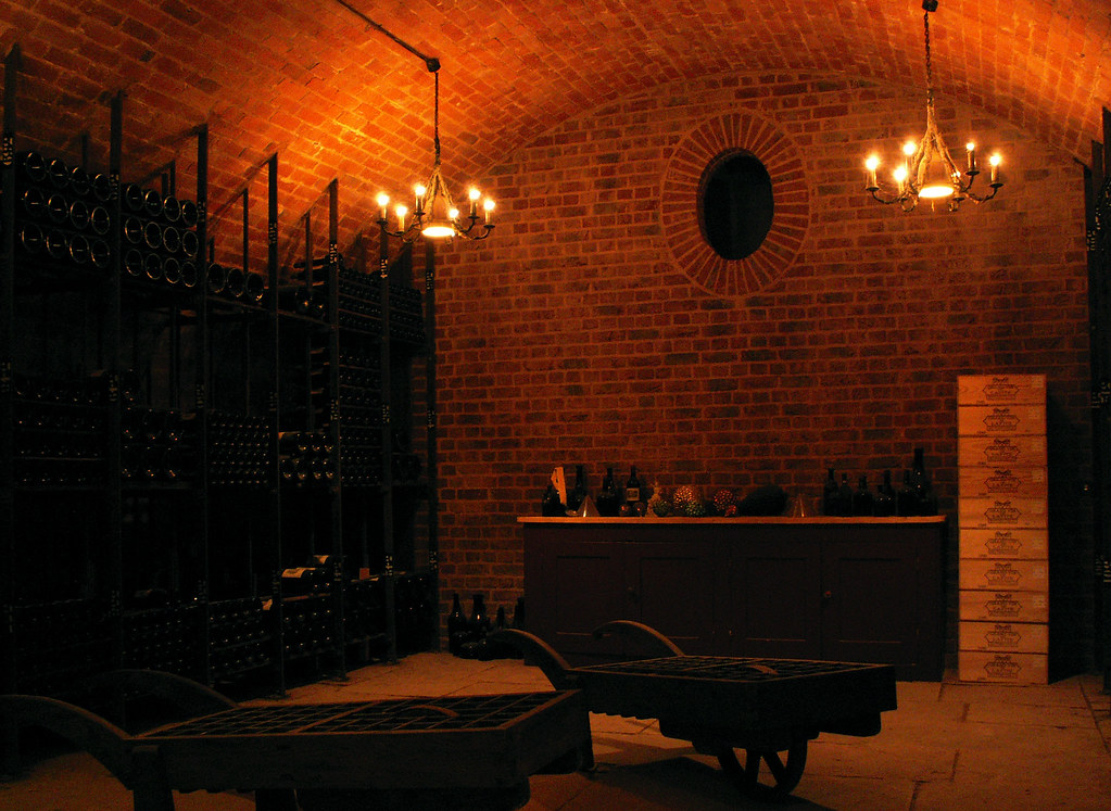 Brick-vaulted wine cellar with racks