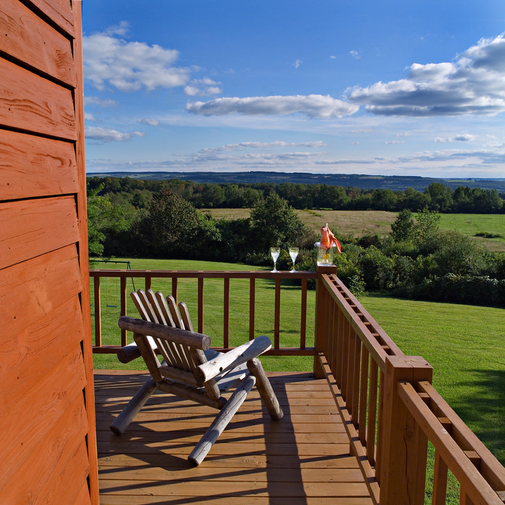 Cottage deck with chairs looking out over fields