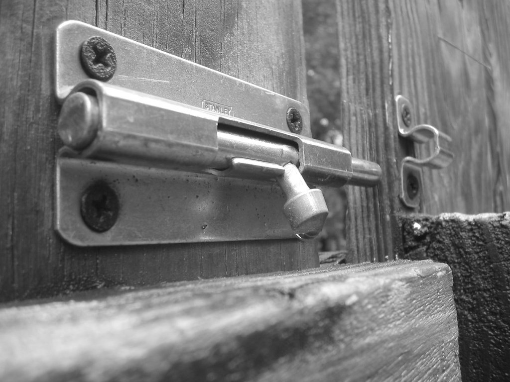 Close view of a sliding bolt on a door